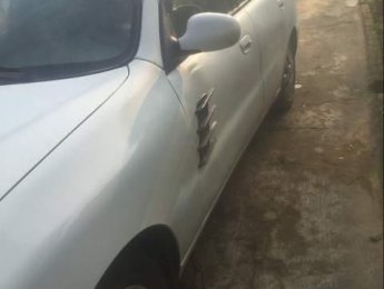 Daewoo Lanos   2001 - Cần bán gấp Daewoo Lanos sản xuất 2001, màu trắng, giá tốt