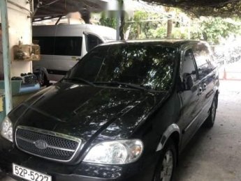 Kia Carnival 2008 - Cần bán Kia Carnival 2008, màu đen, 280 triệu