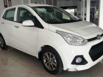 Hyundai Grand i10 1.0 MT 2014 - Bán Hyundai Grand i10 1.0 MT năm 2014, màu trắng