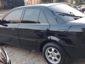 Mazda 323 Classic GLX 2004 - Bán gấp Mazda 323 Classic GLX sản xuất năm 2004, màu đen  