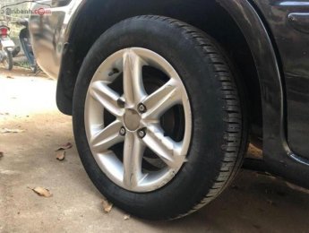 Mazda 323 2002 - Bán Mazda 323 đời 2002, màu đen, nhập khẩu  