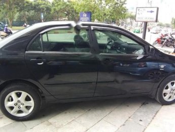Toyota Corolla altis MT 2005 - Cần bán xe Toyota Corolla altis sản xuất 2005, màu đen 