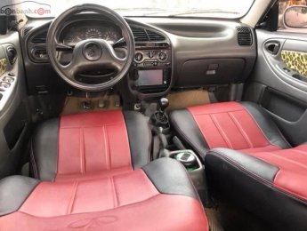 Daewoo Lanos SX 2002 - Cần bán xe Daewoo Lanos SX 2002, màu trắng, xe máy nổ êm