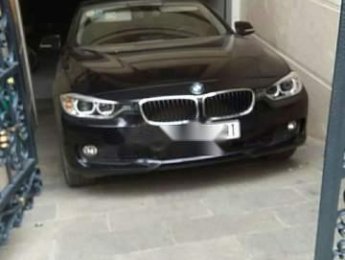 BMW 3 Series 320i  2014 - Cần bán lại xe BMW 3 Series 320i 2014, màu đen, xe nhập xe gia đình