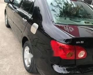 Toyota Corolla altis 2003 - Cần bán Toyota Corolla altis đời 2003, màu đen đẹp như mới giá cạnh tranh