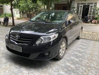 Toyota Corolla altis 2010 - Bán Toyota Corolla Altis đời 2010, màu đen xe gia đình