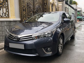 Toyota Corolla altis MT 2015 - Bán Toyota Altis 2015 số sàn, màu xanh rất đẹp