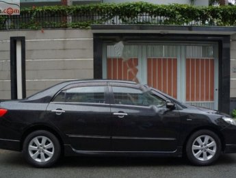 Toyota Corolla altis 1.8G MT 2009 - Bán Toyota Corolla altis 1.8G MT đời 2009, màu đen, số sàn