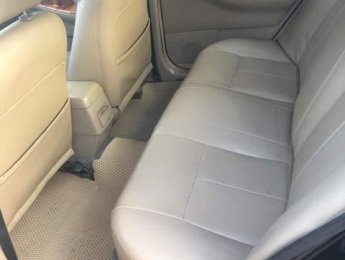 Toyota Corolla altis  MT 2003 - Bán xe Toyota Corolla altis MT đời 2003, màu đen, xe nhập, xe gia đình sử dụng