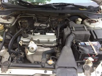 Mitsubishi Lancer   1.6 AT   2004 - Cần bán xe Mitsubishi Lancer 1.6 AT năm sản xuất 2004, màu bạc, mọi thứ nguyên bản