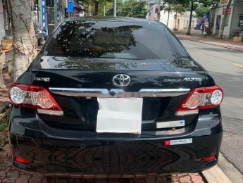 Toyota Corolla altis   2011 - Bán Toyota Corolla altis đời 2011, màu đen