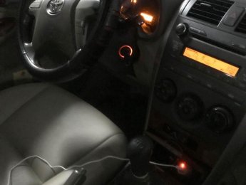 Toyota Corolla altis   2009 - Bán xe Toyota Corolla altis sản xuất năm 2009, màu đen đã đi 200.000 km
