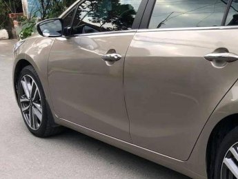 Kia K3 2018 - Bán xe Kia K3 năm sản xuất 2018, màu vàng cát, nhập khẩu