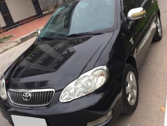 Toyota Corolla altis 2005 - Cần bán Corola Altis 2005 số sàn, màu đen xe zin cọp