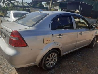 Daewoo Gentra   2006 - Cần mua 7 chỗ bán xe Daewoo Gentra sản xuất 2006, màu bạc, nhập khẩu