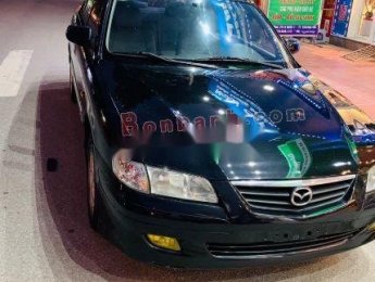 Mazda 626    2004 - Cần bán lại xe Mazda 626 sản xuất năm 2004, 215 triệu