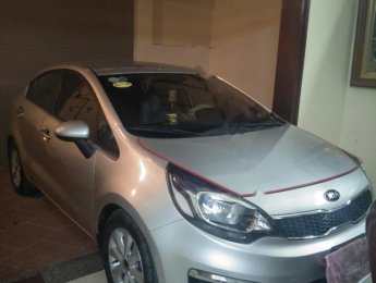 Kia Rio 2016 - Cần bán xe Kia Rio năm sản xuất 2016, màu bạc xe nguyên bản