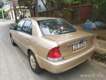 Ford Laser 2001 - Cần bán xe Ford Laser năm 2001, màu vàng, số sàn, 99 triệu