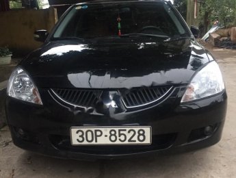 Mitsubishi Lancer 2004 - Cần bán Mitsubishi Lancer năm sản xuất 2004, màu đen, 205tr
