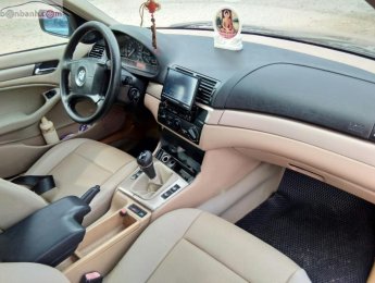 BMW 3 Series 2001 - Cần bán lại xe BMW 318i đời 2001, màu đen chính chủ