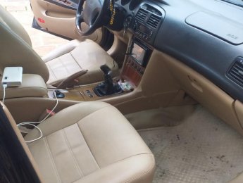 Daewoo Magnus 2003 - Cần bán Daewoo Magnus đời 2003, màu đen, nhập khẩu nguyên chiếc 