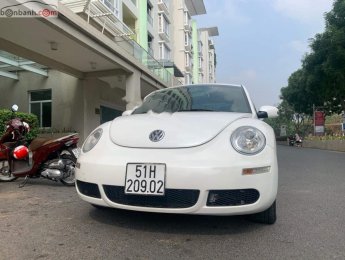 Volkswagen Beetle   2010 - Bán Volkswagen Beetle 1.6AT sản xuất năm 2010, màu trắng, nhập khẩu  