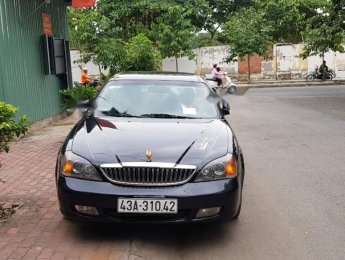 Daewoo Magnus 2.5  2004 - Cần bán gấp Daewoo Magnus 2.5 năm 2004, màu đen, nhập khẩu nguyên chiếc, giá 135tr