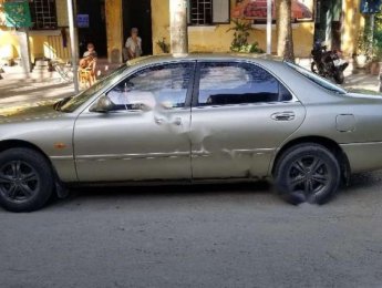 Mazda 626 1994 - Cần bán Mazda 626 sản xuất 1994, màu vàng, nhập khẩu nguyên chiếc giá cạnh tranh