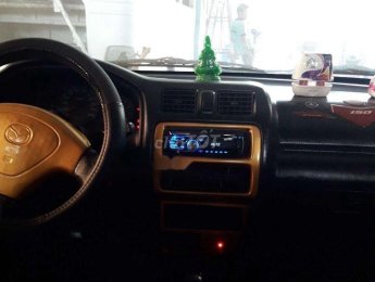 Mazda 323    1999 - Cần bán lại xe Mazda 323 sản xuất năm 1999, màu trắng giá cạnh tranh