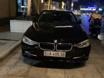 BMW 3 Series 320i 2013 - Cần bán lại xe BMW 3 Series 320i đời 2013, màu đen, xe nhập chính chủ