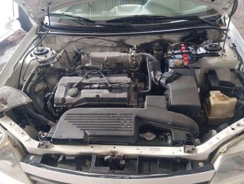 Ford Laser MT 2000 - Bán Ford Laser MT sản xuất năm 2000, màu trắng, xe nhập chính chủ