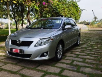 Toyota Corolla altis 2010 - Cần bán lại xe Toyota Corolla altis 2.0V đời 2010, màu bạc, biển SG 4 số - chuẩn chỉ 144.000km