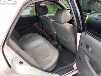 Ford Laser   LX 1.6 MT   1999 - Cần bán gấp Ford Laser LX 1.6 MT năm sản xuất 1999, màu trắng