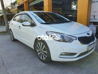 Kia K3 2014 - Cần bán lại xe Kia K3 đời 2014, màu trắng xe gia đình