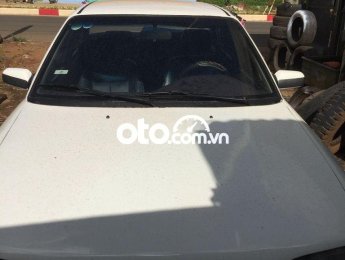 Mazda 323    1996 - Bán Mazda 323 1996, màu trắng, nhập khẩu, giá 48tr