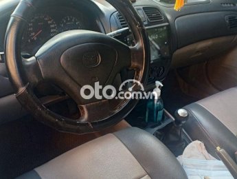 Mazda 323 2001 - Bán Mazda 323 2001, màu bạc, 105 triệu