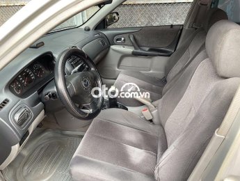 Mazda 323   MT 2003 - Cần bán Mazda 323 MT năm sản xuất 2003, màu bạc, 160 triệu