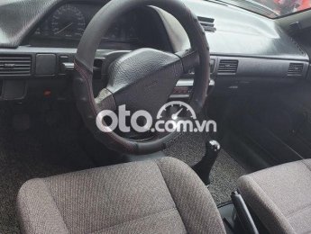 Mazda 323 1995 - Bán Mazda 323 đời 1995, màu trắng, nhập khẩu nguyên chiếc, giá 70tr