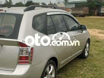 Kia Carens   2009 - Cần bán Kia Carens đời 2009, màu bạc số sàn giá cạnh tranh