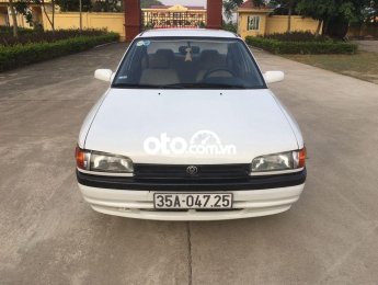 Mazda 323 1997 - Cần bán lại xe Mazda 323 đời 1997, màu trắng, xe nhập  