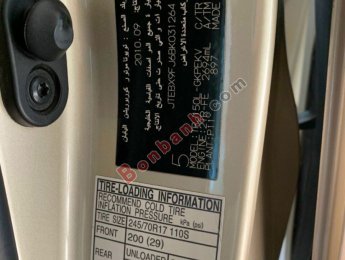 Toyota Prado   TXL 2.7L  2010 - Cần bán gấp Toyota Prado TXL 2.7L sản xuất 2010, màu vàng, xe nhập, giá 950tr
