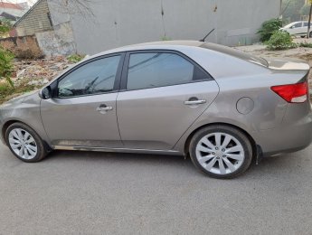 Kia Forte AT 2011 - Bán Kia Forte AT năm 2011, màu xám chính chủ