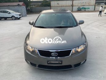 Kia Forte AT 2011 - Bán Kia Forte AT năm sản xuất 2011, màu xám như mới