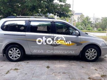 Kia Carnival MT 2009 - Cần bán Kia Carnival MT năm sản xuất 2009, màu bạc, nhập khẩu nguyên chiếc