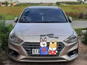 Hyundai Accent 1.4AT 2019 - Cần bán gấp Hyundai Accent 1.4AT năm 2019, màu bạc xe gia đình, giá tốt