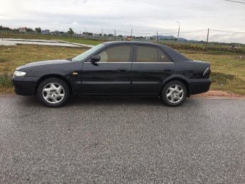 Mazda 626   2.0 MT  2001 - Cần bán Mazda 626 2.0 MT năm sản xuất 2001, màu đen xe gia đình