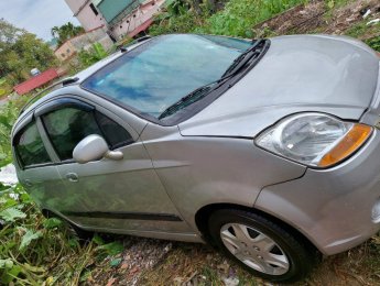 Chevrolet Spark 2010 - Bán ô tô Chevrolet Spark LT sản xuất năm 2010, màu bạc