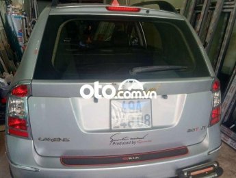 Kia Carens MT 2010 - Cần bán gấp Kia Carens MT sản xuất năm 2010, màu bạc, giá tốt