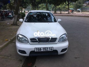 Daewoo Lanos MT 2005 - Bán Daewoo Lanos MT sản xuất năm 2005, màu trắng giá cạnh tranh