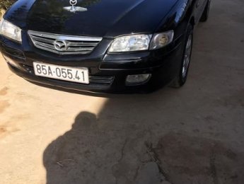Mazda 626 MT 2002 - Cần bán xe Mazda 626 MT sản xuất năm 2002, màu đen